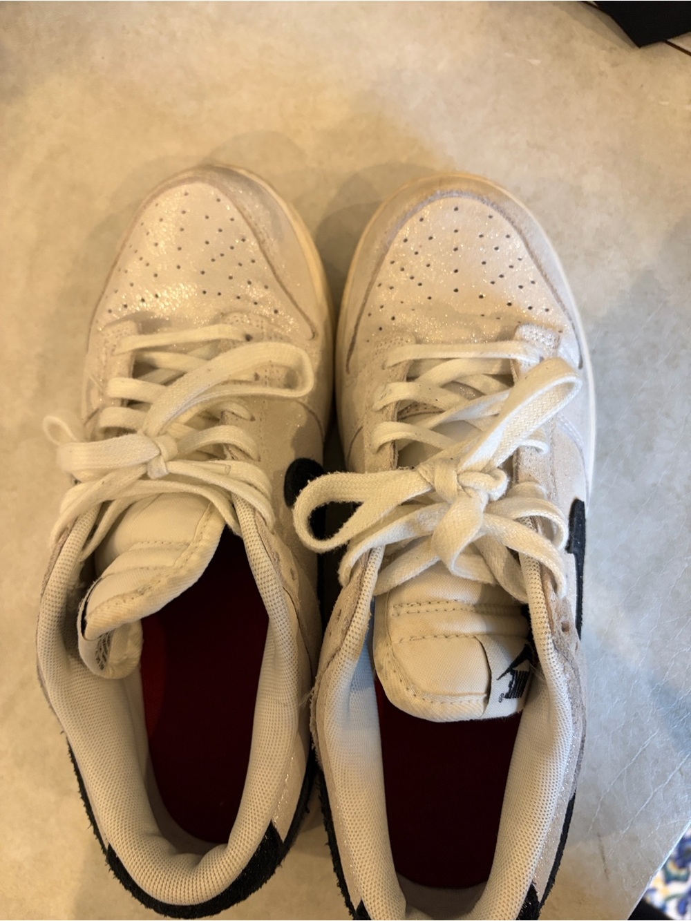 Nike White Low-Top Athletic Sneakers with Black Swoosh